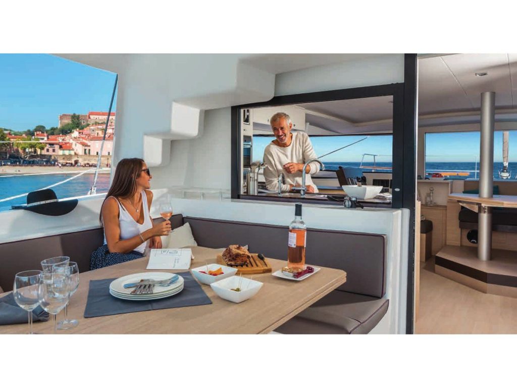 Saloon and cockpit of catamaran Bali 4.5 LeAndra for charter in Orhaniye in Turkey