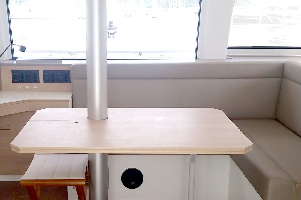 Saloon table in catamaran Bali 4.5 LeAndra for charter in Orhaniye in Turkey