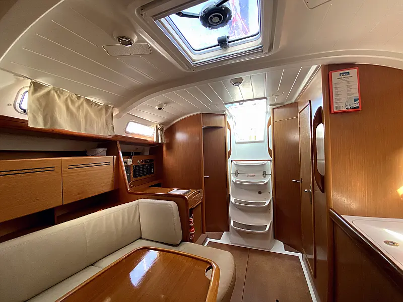 Saloon table in sailing boat Beneteau Cyclades 39.3 Six Pack for charter in Fethiye in Turkey