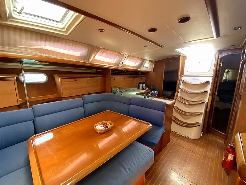 Saloon table in sailing boat Beneteau Cyclades 39.3 Six Pack for charter in Fethiye in Turkey