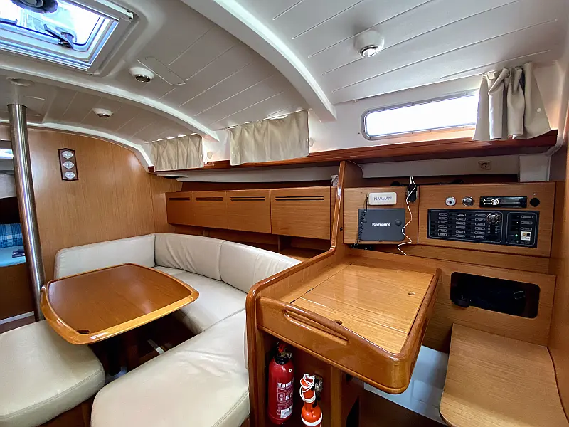 Saloon table in sailing boat Beneteau Cyclades 39.3 Six Pack for charter in Fethiye in Turkey