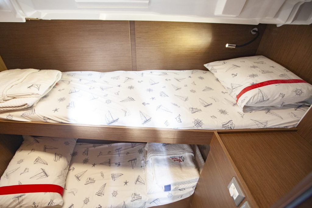 Bunk bed cabin in sailing yacht Beneteau Oceanis 46.1 Breezy in Orhaniye near Marmaris in Turkey