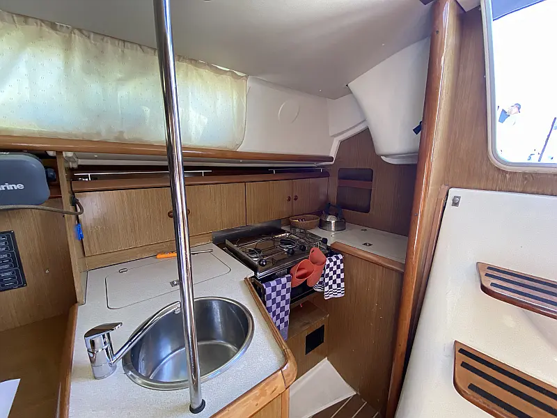 Galley in sailing boat Jeanneau Sun Odyssey 32i Elif for charter in Fethiye in Turkey