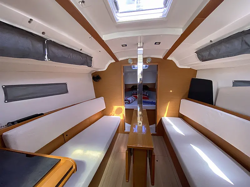 Saloon table in sailing boat Jeanneau Sun Odyssey 349 Blue Dreams for charter in Fethiye in Turkey