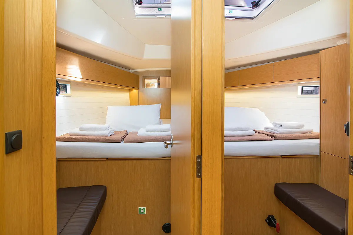 Forward cabins in sailing yacht Bavaria Cruiser 46 Simbl for charter in Corfu in Greece