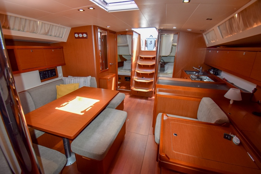 Saloon table and navigation table in sailing yacht Beneteau Oceanis 45 Tonic in Marmaris in Turkey