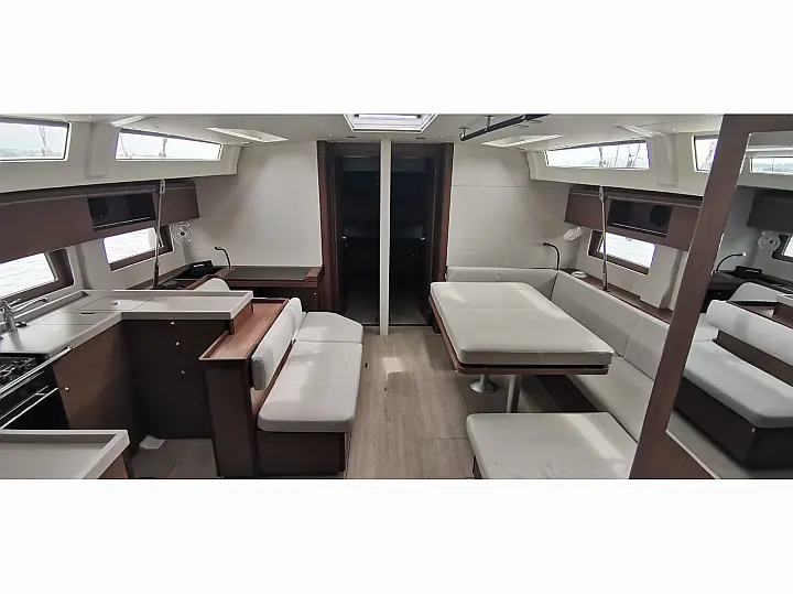 Saloon table in sailing yacht Beneteau Oceanis 51.1 Forkys in Preveza in Greece