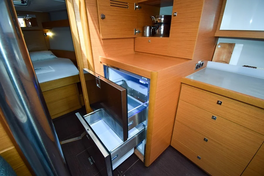 Fridge in galley in sailing yacht Dufour 430 Grand Large Ida for charter in Marmaris in Turkey