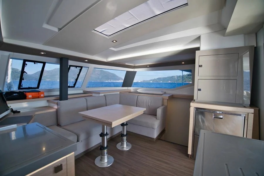 Saloon table in catamaran Fountaine Pajot Astrea 42 Adele in Marmaris in Turkey