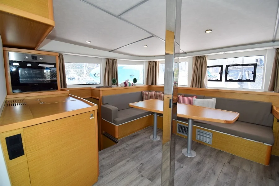 Saloon table in catamaran Lagoon 42 Bige for charter in Marmaris in Turkey