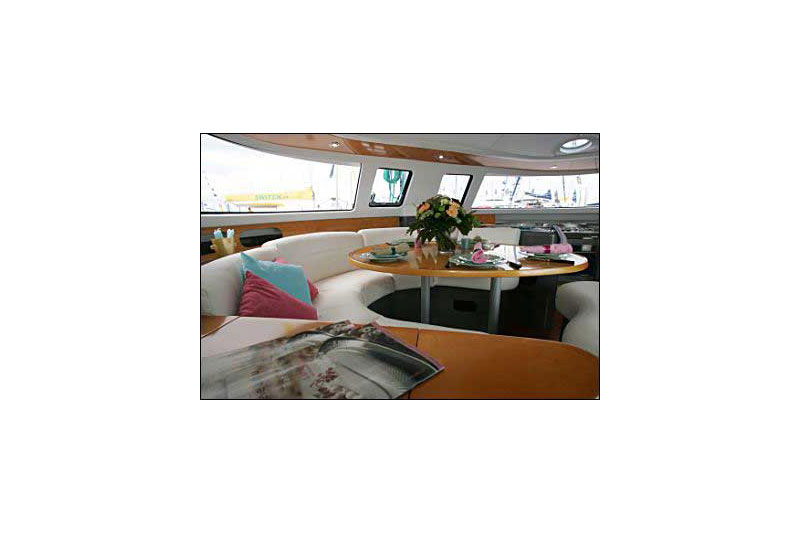 Saloon table in catamaran Fountaine Pajot Belize 43 Piropo for charter in Cuba