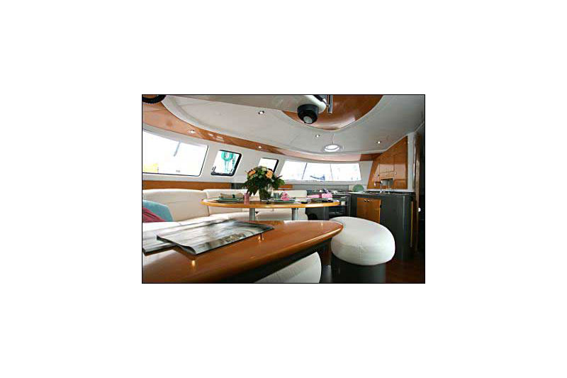 Saloon table in catamaran Fountaine Pajot Belize 43 Piropo for charter in Cuba