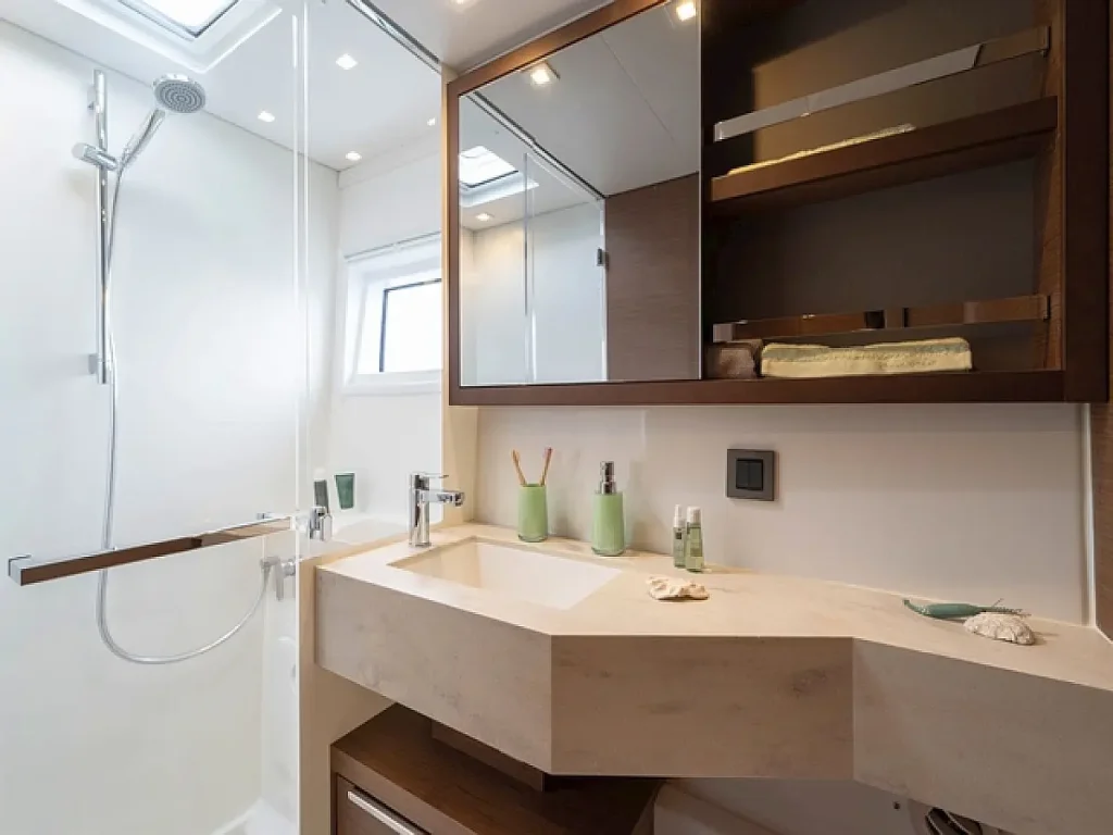 Shower in bathroom in catamaran Lagoon 46 Sol Griso for charter in Cuba