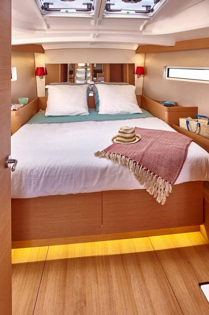 Forward cabin of sailing yacht Jeanneau Sun Odyssey 440
