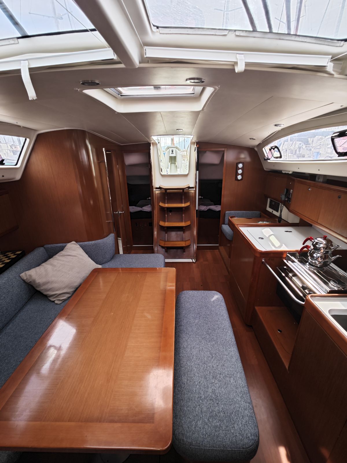 Saloon table in sailing yacht Beneteau Oceanis 40 Violet for charter in Fethiye in Turkey