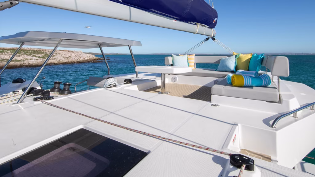 Sunbathing deck of catamaran Moorings 4200 with 3 cabins for charter in Grenada in Caribbean