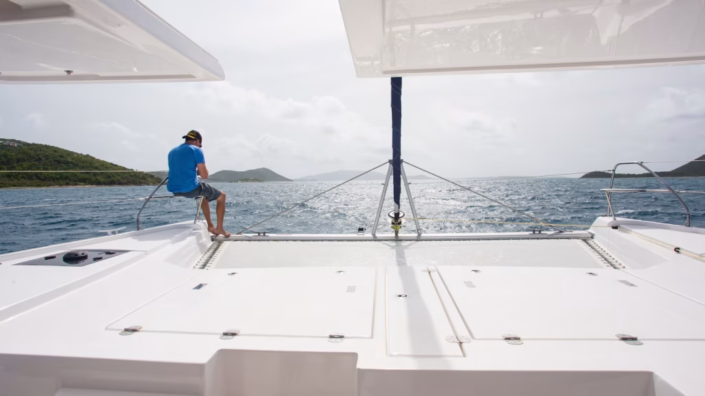 Sunbathing deck of catamaran Moorings 5000 with 5 cabins for charter in Nassau in Bahamas in Caribbean