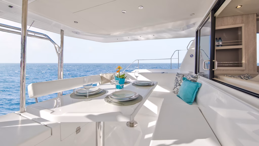 Cockpit table of power catamaran Moorings 433 PC for charter in Tortola in British Virgin Islands in Caribbean